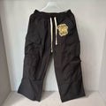 Mixed Emotion Patch Logo Multi‑Pocket Cargo Pants