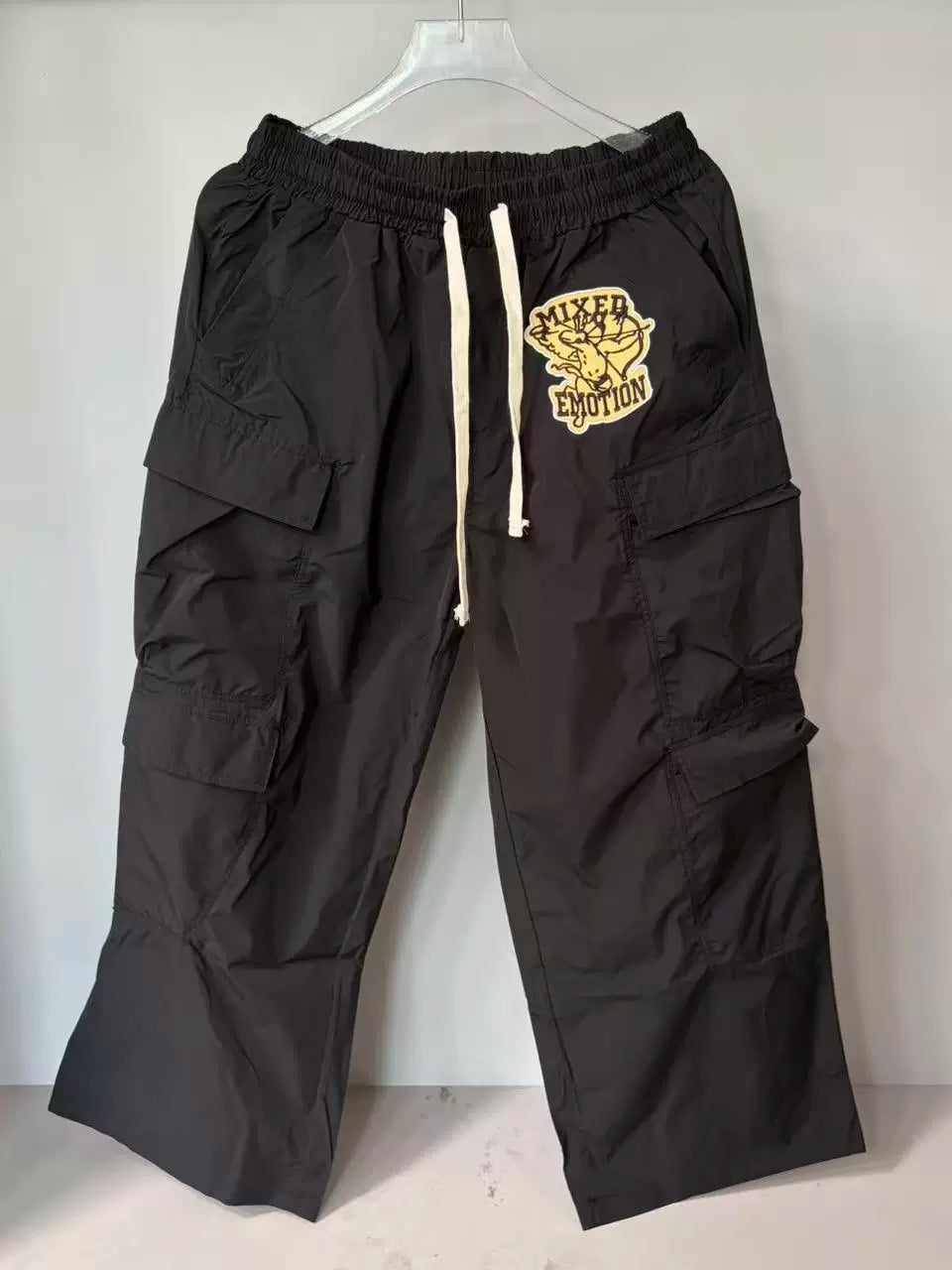 Mixed Emotion Patch Logo Multi‑Pocket Cargo Pants