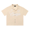 Mixed EMOTION Cursive Cupid Beige Camp Collar Short‑Sleeve Button‑Up Shirt