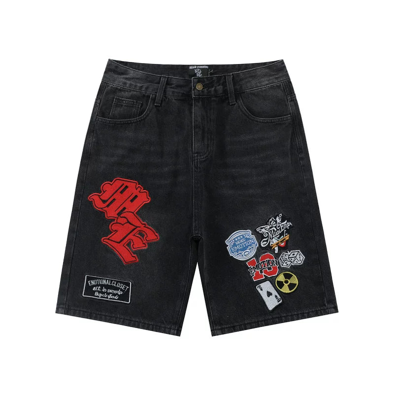 MIXED EMOTION Multi‑Patch Embroidered Black Denim Jorts